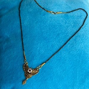 Small black beaded with pendant